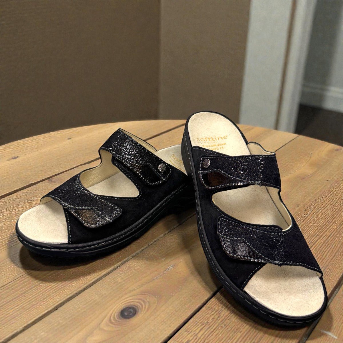 Softline Hedi black leather wedge sandals with adjustable straps and comfortable exchangeable footbed.
photo of the front side