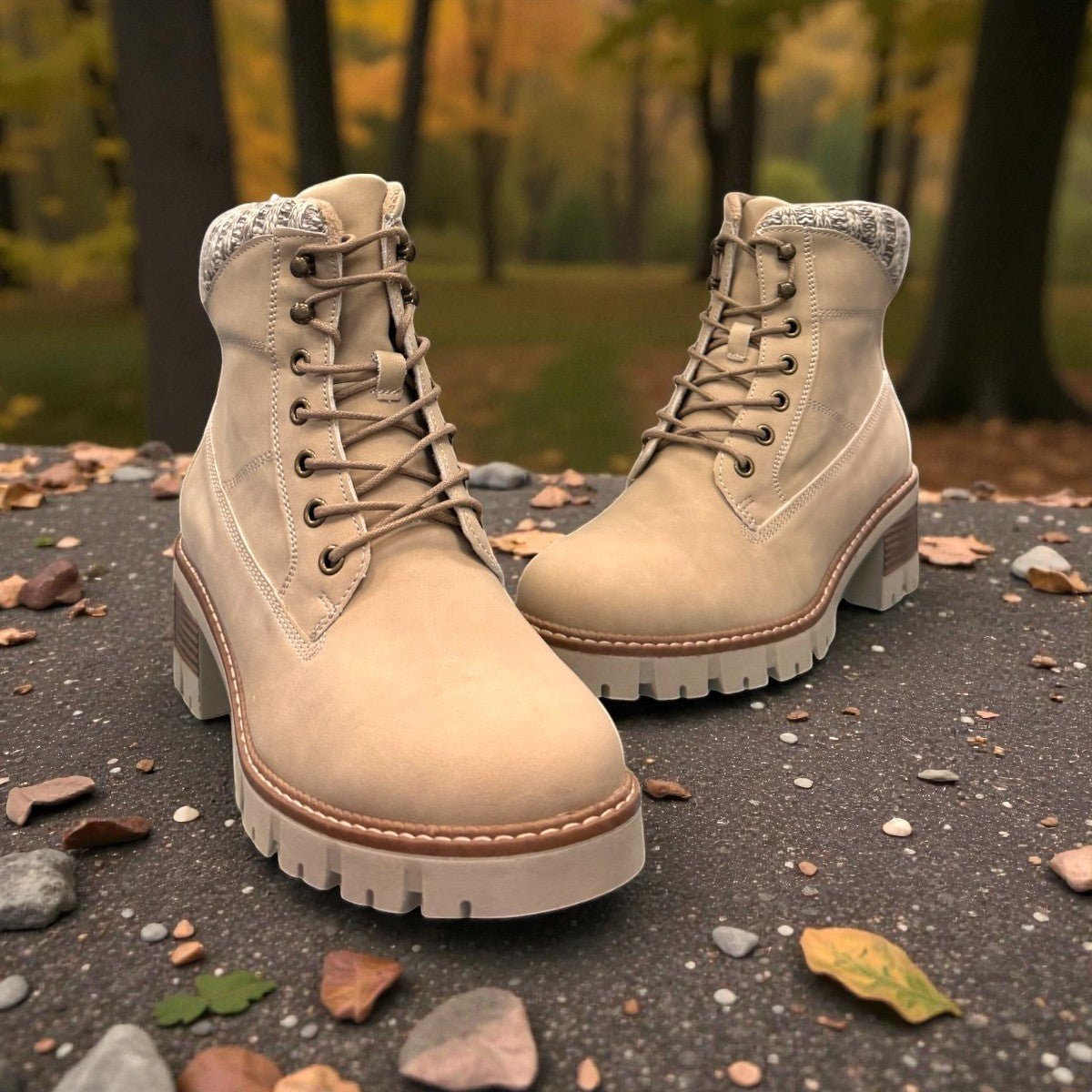 stefania F700 beige synthetic lace-up boot with a knitted cuff, side zip, and chunky block heel.
photo of the front side