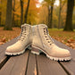 stefania F700 beige synthetic lace-up boot with a knitted cuff, side zip, and chunky block heel.
photo of the front side
