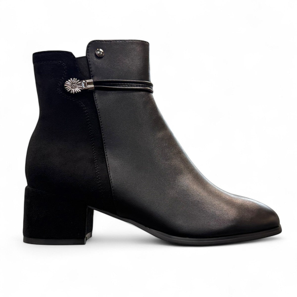 stefania F7001 black vegan leather dress booties with a block heel, fur lining, and decorative side button detail.
photo of the right side
