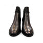 stefania F7001 black vegan leather dress booties with a block heel, fur lining, and decorative side button detail.
photo of the front side