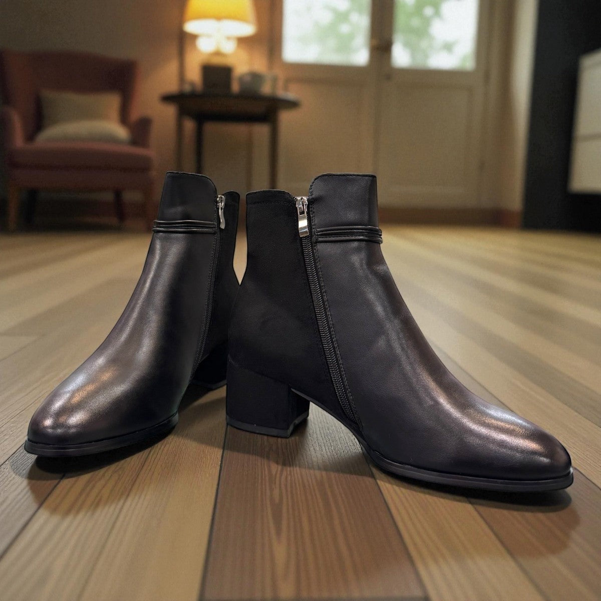 stefania F7001 black vegan leather dress booties with a block heel, fur lining, and decorative side button detail.
photo of the front side