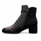 stefania F7001 black vegan leather dress booties with a block heel, fur lining, and decorative side button detail.
photo of the left side