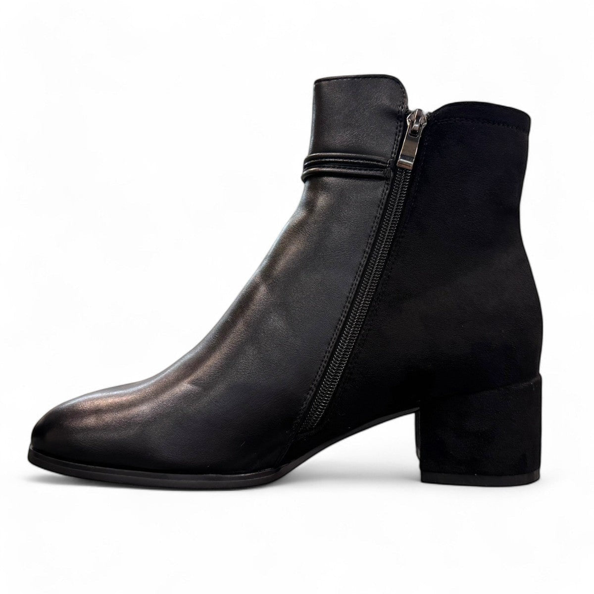 stefania F7001 black vegan leather dress booties with a block heel, fur lining, and decorative side button detail.
photo of the left side
