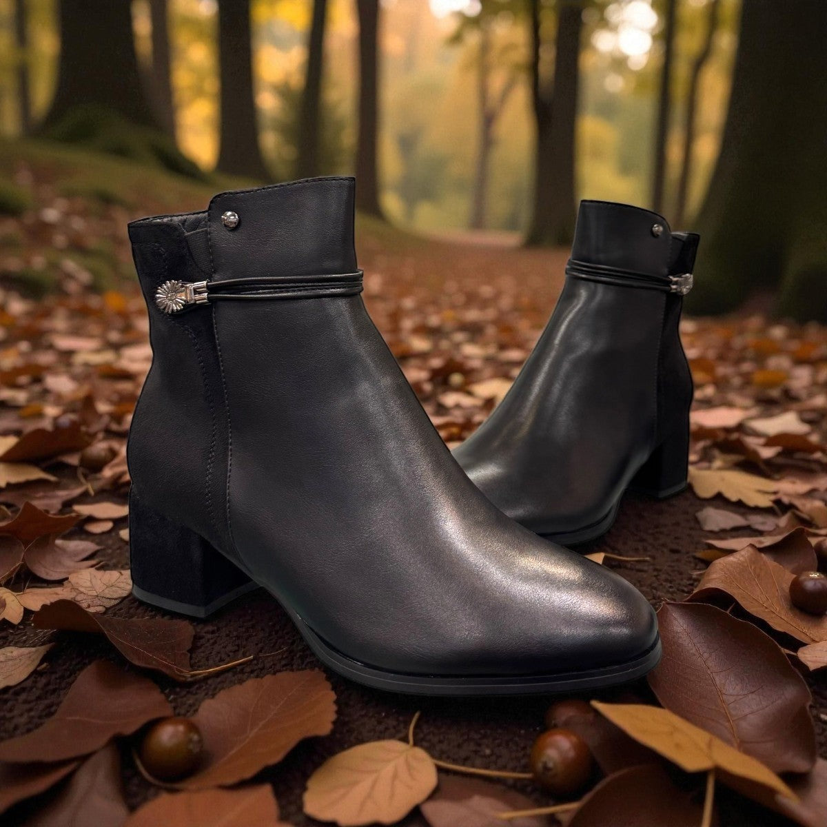 stefania F7001 black vegan leather dress booties with a block heel, fur lining, and decorative side button detail.
photo of the front side