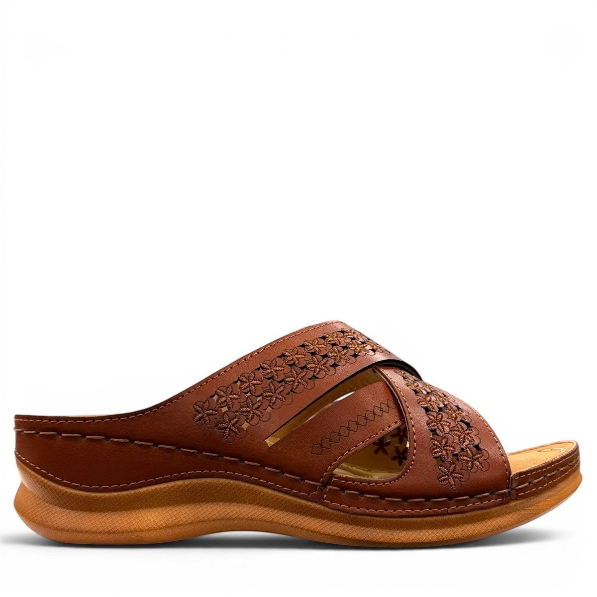 stefania camel vegan leather slide sandal with floral laser-cut details and a comfortable cushioned sole.
photo of the right side