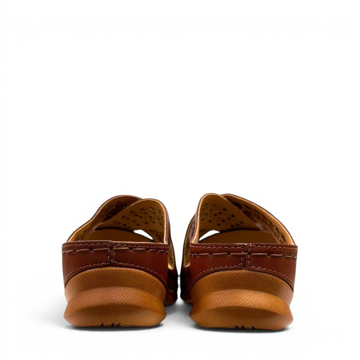stefania camel vegan leather slide sandal with floral laser-cut details and a comfortable cushioned sole.
photo of the back side