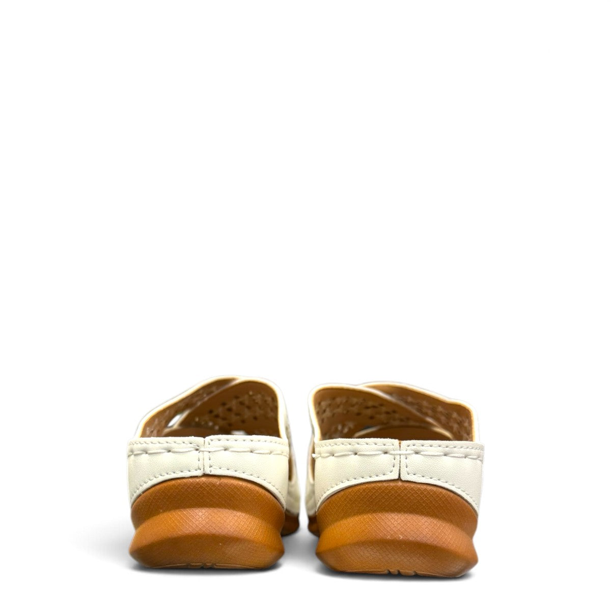 stefania S20215 white vegan leather slide sandals with floral cut-out details and a comfortable brown wedge sole.
 photo of the back side