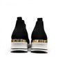 STEFANIA S4000 black slip-on knit platform sneakers with a white wedge sole and subtle shimmer details.
photo of the back side