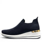 stefania S4000 navy blue slip-on knit platform sneakers with decorative shimmer and white wedge sole.
photo of the left side