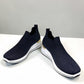 stefania S4000 navy blue slip-on knit platform sneakers with decorative shimmer and white wedge sole.
photo of the front side