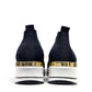 stefania S4000 navy blue slip-on knit platform sneakers with decorative shimmer and white wedge sole.
photo of the back side