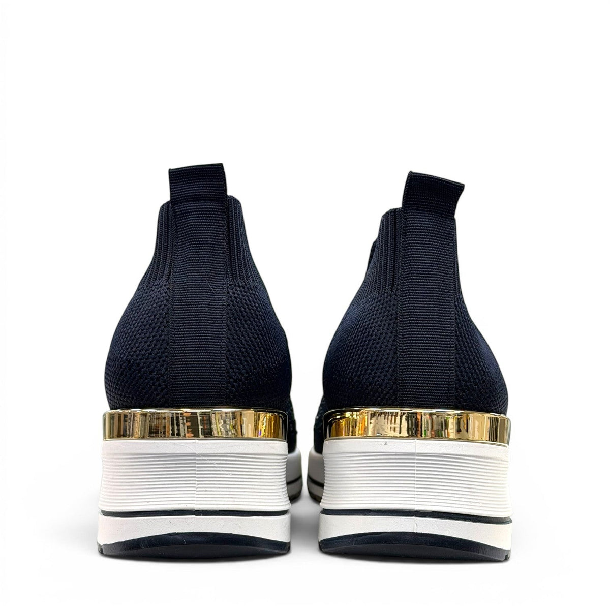 stefania S4000 navy blue slip-on knit platform sneakers with decorative shimmer and white wedge sole.
photo of the back side