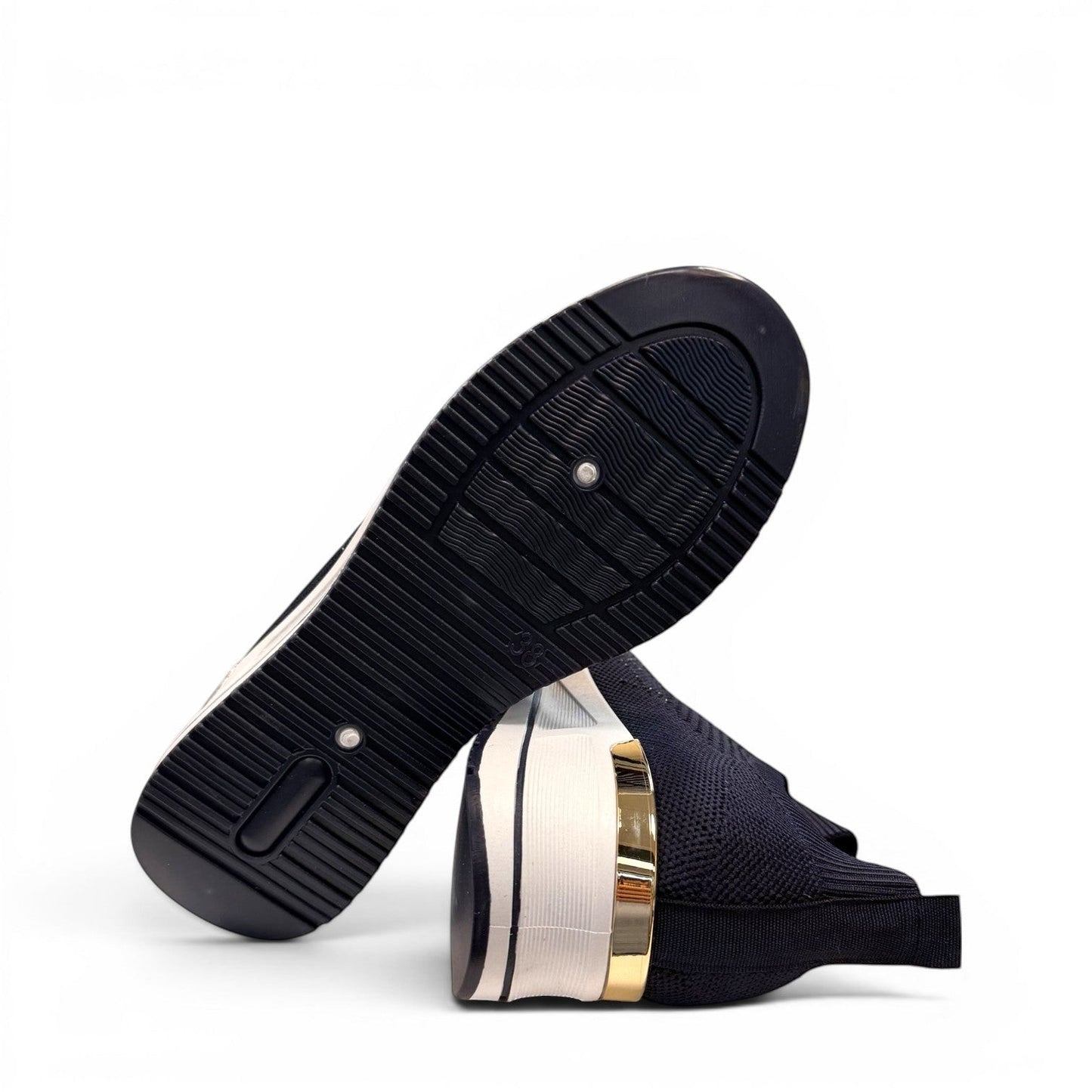 stefania S4000 navy blue slip-on knit platform sneakers with decorative shimmer and white wedge sole.
photo of the bottom side
