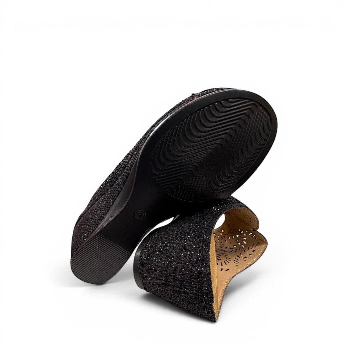 stefania S5036 black sparkle wedge sandals with elegant laser-cut detailing and a comfortable cushioned footbed.
photo of the bottom side