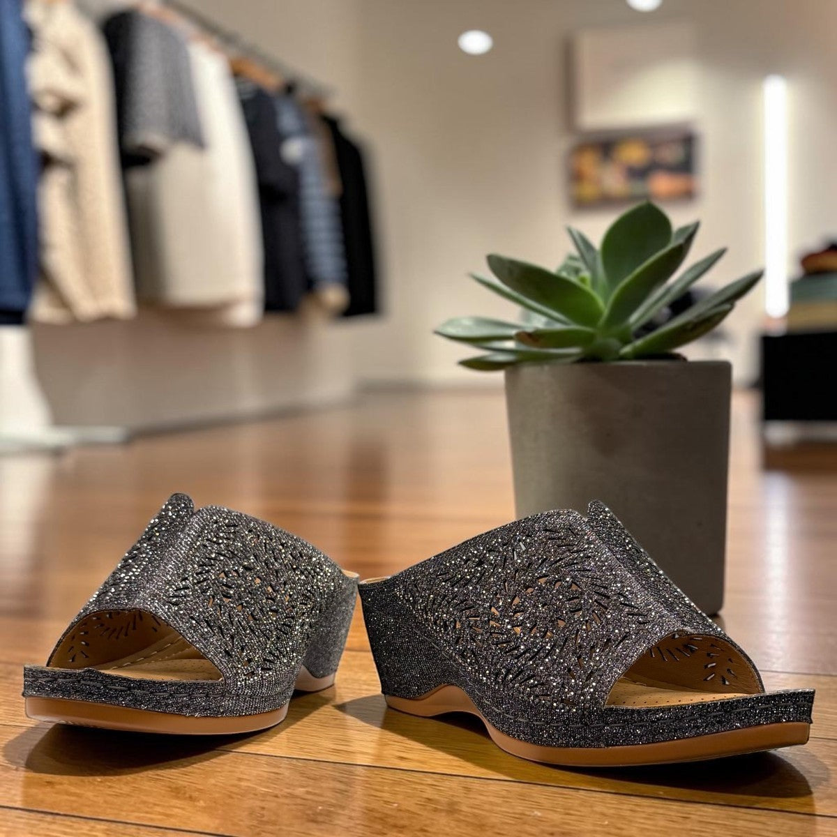 stefania S5036 pewter sparkle wedge sandals with elegant laser-cut detailing and a comfortable cushioned footbed.
photo of the front side
