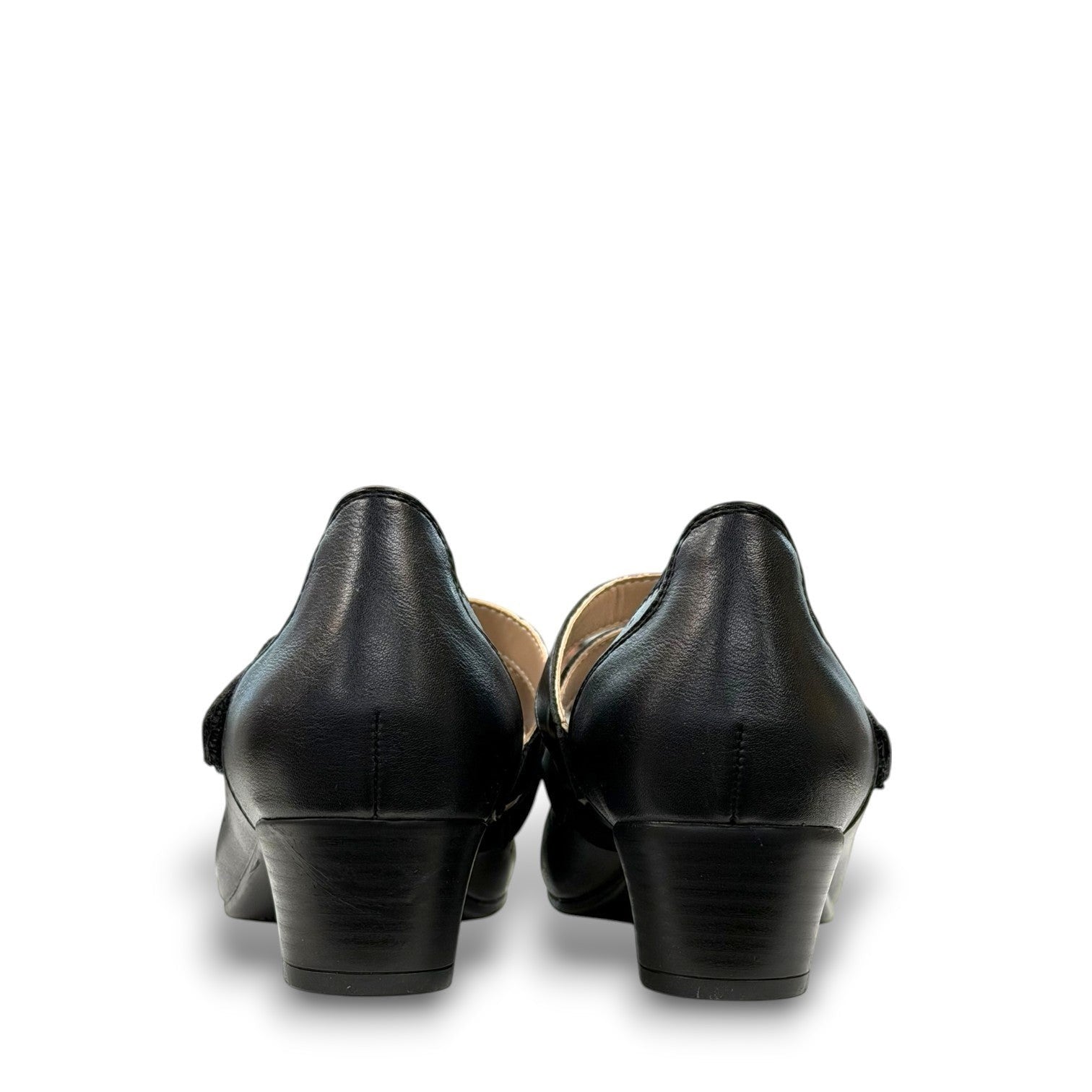 stefania aria black Mary Jane shoe with decorative laser-cut perforations, dual straps, and a stable block heel.
photo of the back side