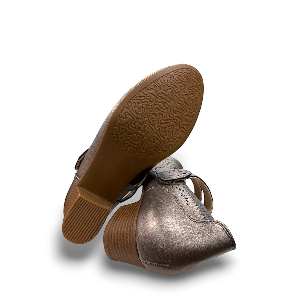 stefania aria pewter Mary Jane shoes with decorative laser-cut perforations, dual straps, and a stable block heel.
photo of the bottom side