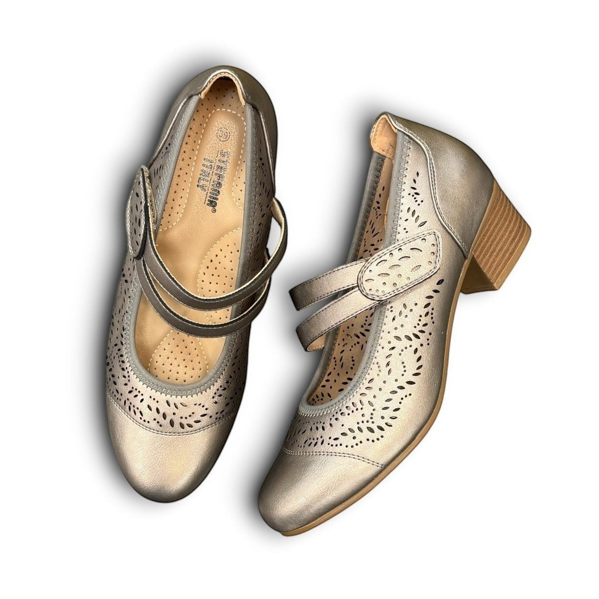 stefania aria pewter Mary Jane shoes with decorative laser-cut perforations, dual straps, and a stable block heel.
photo of the top side
