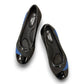 STEFANIA ballet flat in black and navy with a patent toe cap and low-profile wedge heel.
photo of the top side