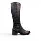 stefania black vegan leather high boots with side zipper, buckle detail, and block heel for winter wear.
photo of the right side