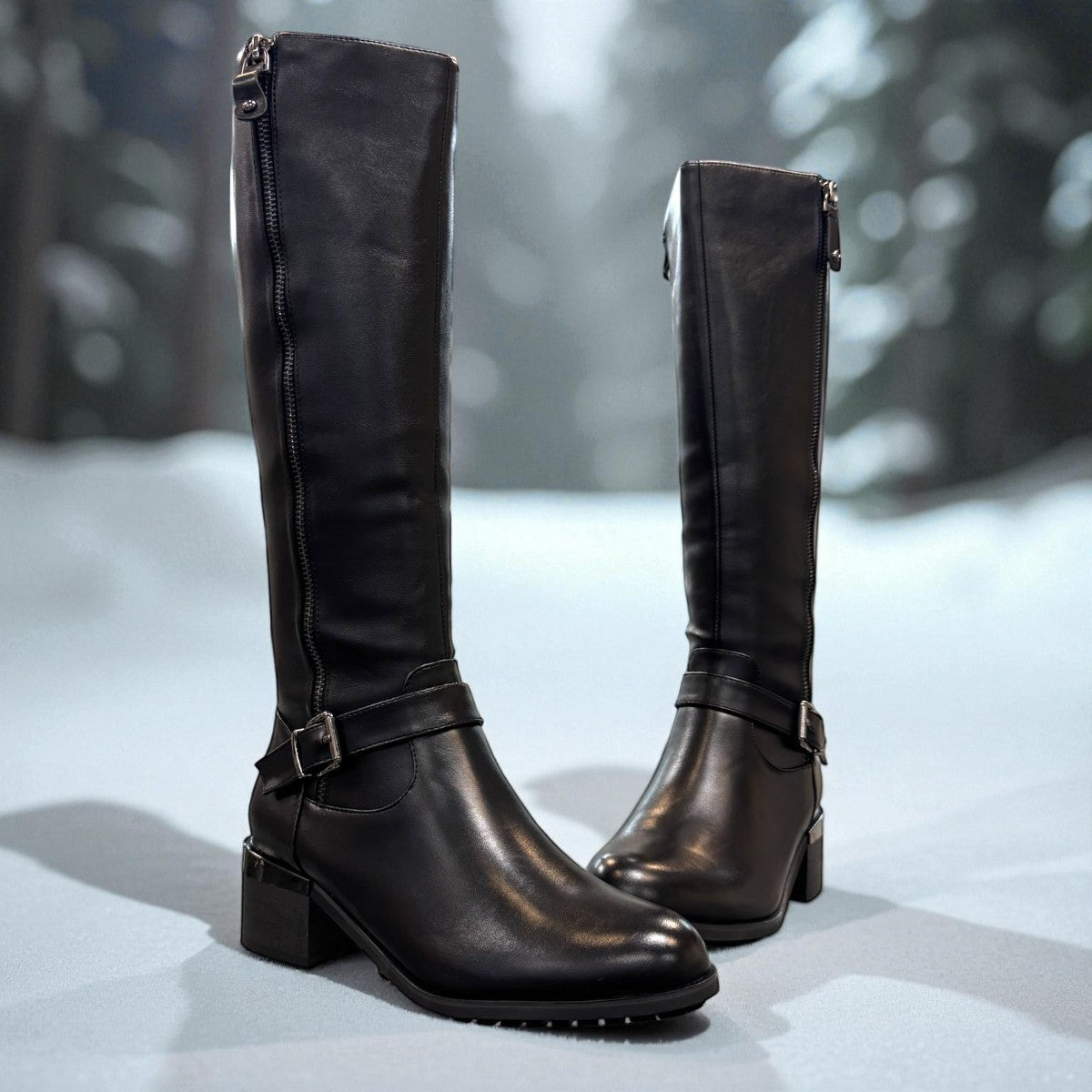 stefania black vegan leather high boots with side zipper, buckle detail, and block heel for winter wear.
photo of the front side