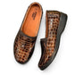 Stefania bronze croc-embossed slip-on shoe with a low wedge sole and elastic side panel.
photo of the top side