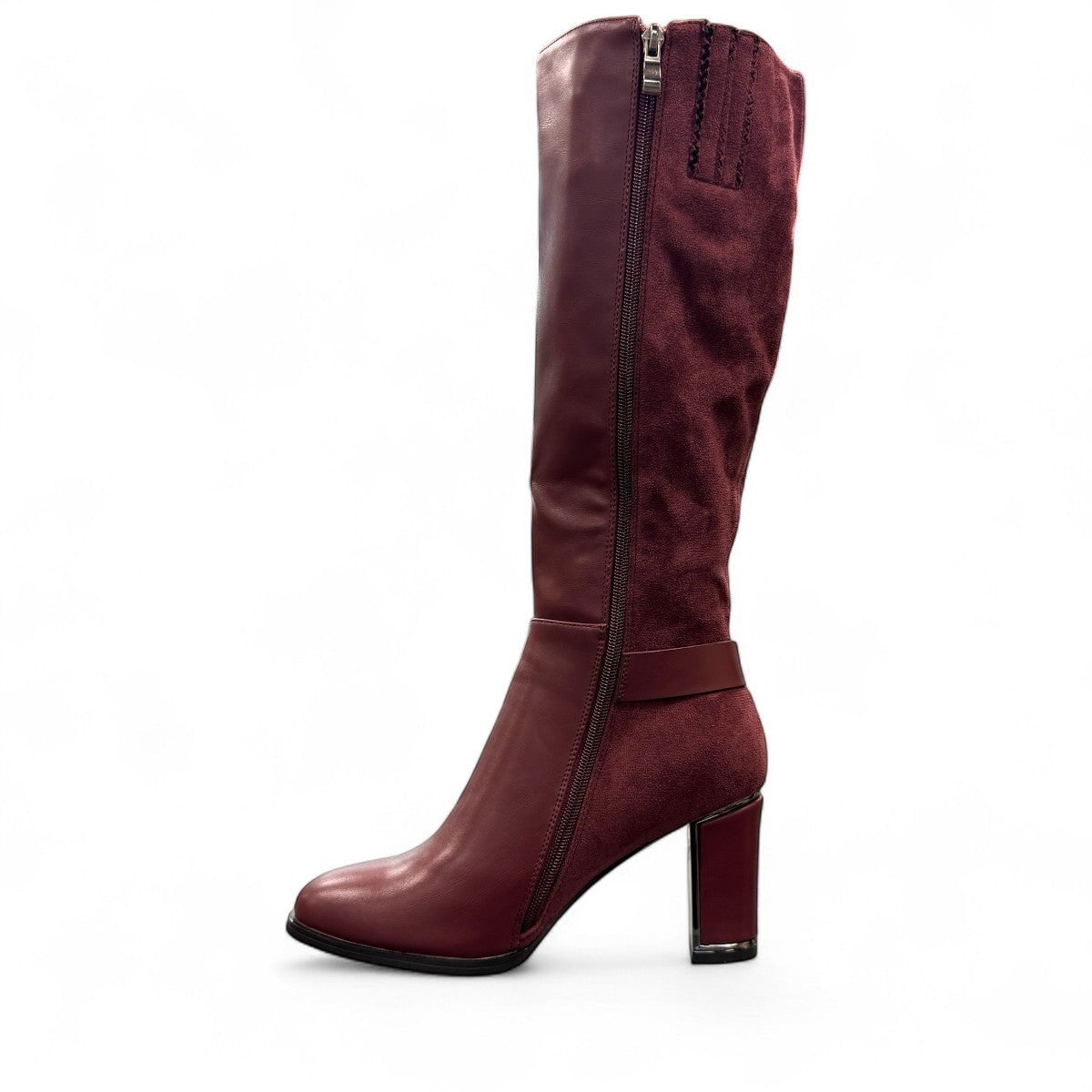 stefania bordo vegan leather knee-high boots with block heel, suede-like panels, and metallic side detail.
photo of the left side