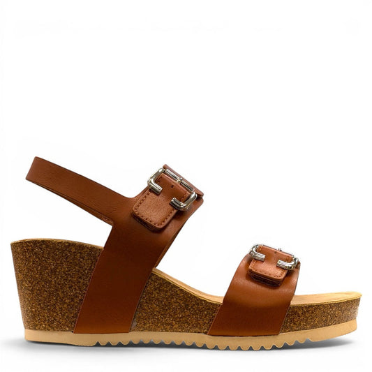 stefania-dalia brown double-strap wedge sandals with adjustable buckles and a cushioned cork-style platform sole.
photo of the right side