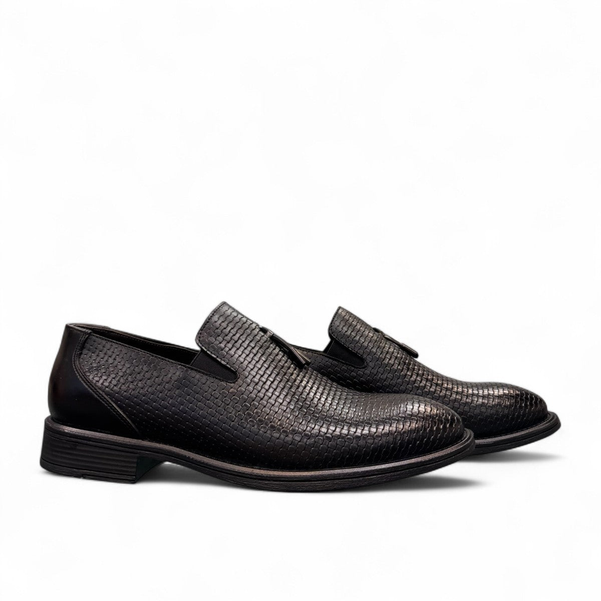 Sun Arad black leather slip-on shoes with woven texture detail and durable rubber outsole. Photo of side views.