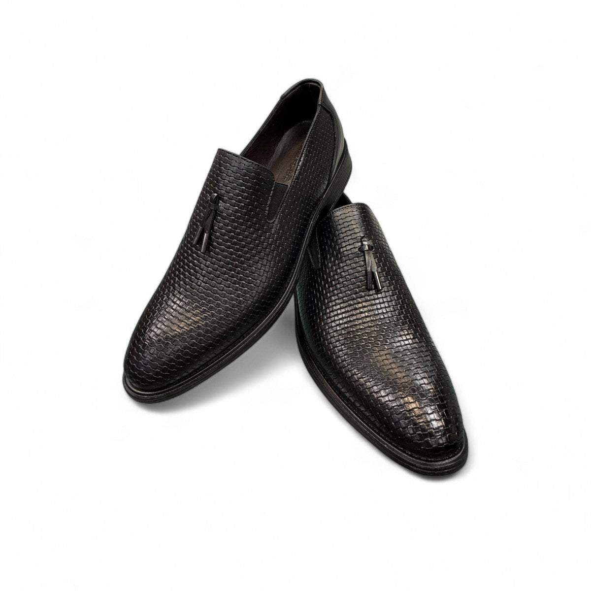 Sun Arad black leather slip-on shoes with woven texture detail and durable rubber outsole. Photo of upper view.