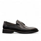 Sun Arad black leather slip-on shoes with woven texture detail and durable rubber outsole. Photo of left side view.
