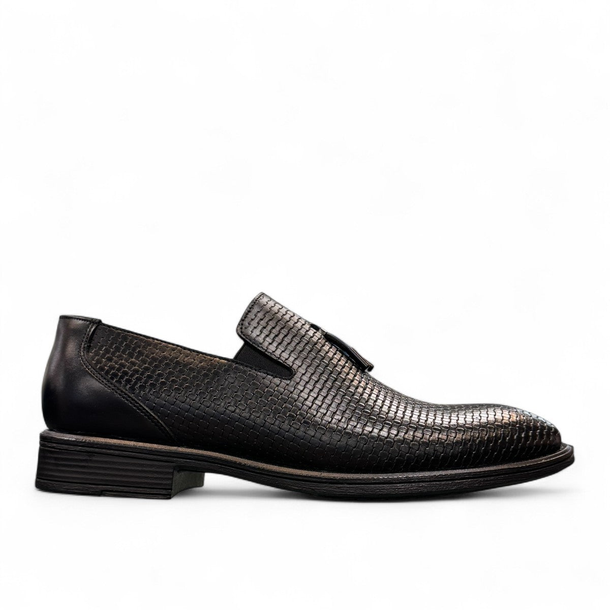 Sun Arad black leather slip-on shoes with woven texture detail and durable rubber outsole. Photo of left side view.