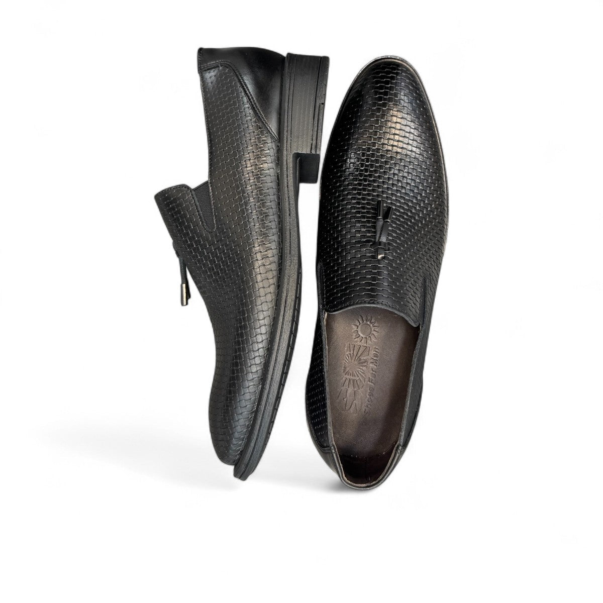 Sun Arad black leather slip-on shoes with woven texture detail and durable rubber outsole. Photo of upper view.