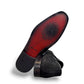 Sun Ashkan black suede loafer with a classic penny strap design and durable rubber outsole. Photo of bottom view.