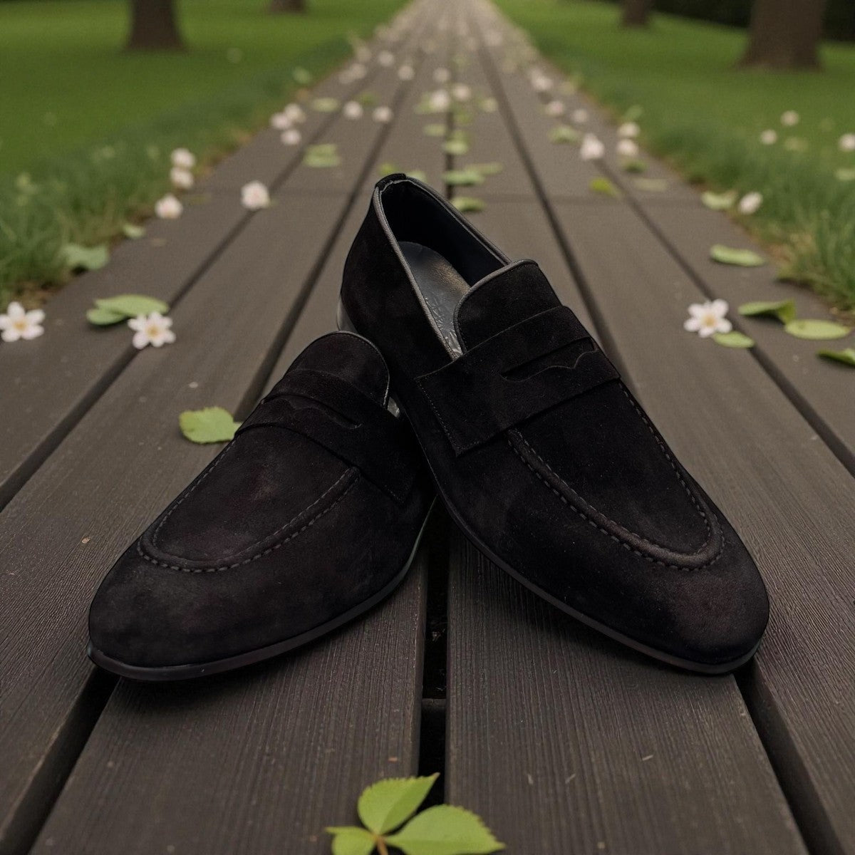 Sun Ashkan black suede loafer with a classic penny strap design and durable rubber outsole. Photo of upper view 1.