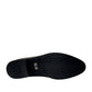 Sun Farhad black leather lace-up dress shoe with brogue detailing and a durable rubber outsole. Photo of bottom view.