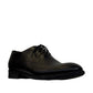 Sun Farhad black leather lace-up dress shoe with brogue detailing and a durable rubber outsole. Photo of front view.