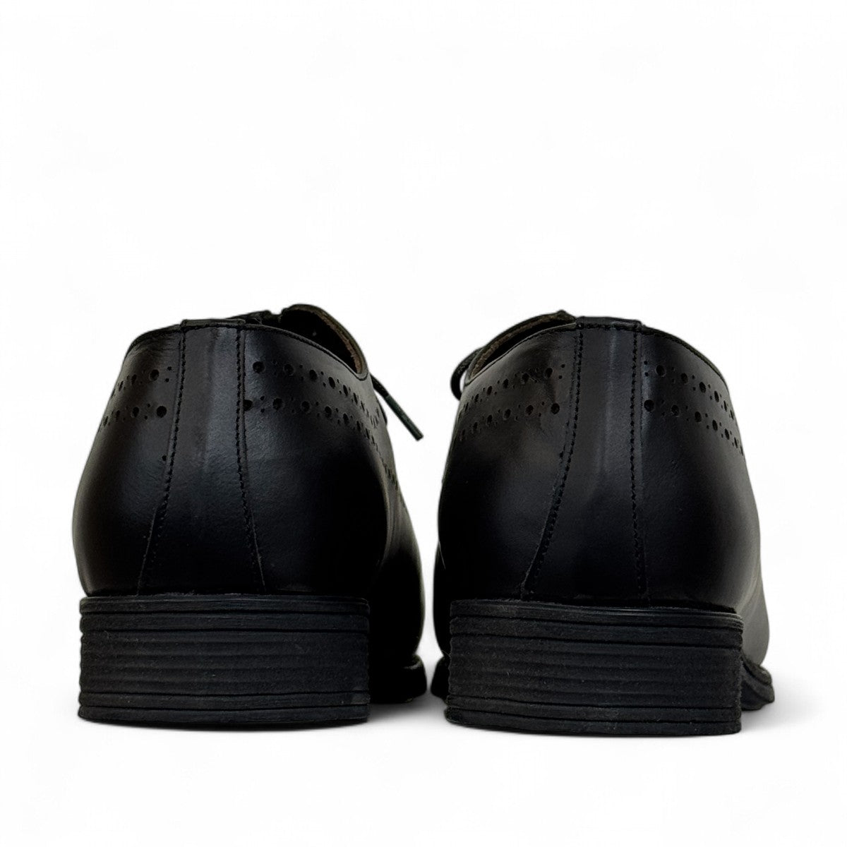 Sun Farhad black leather lace-up dress shoe with brogue detailing and a durable rubber outsole. Photo of back view.
