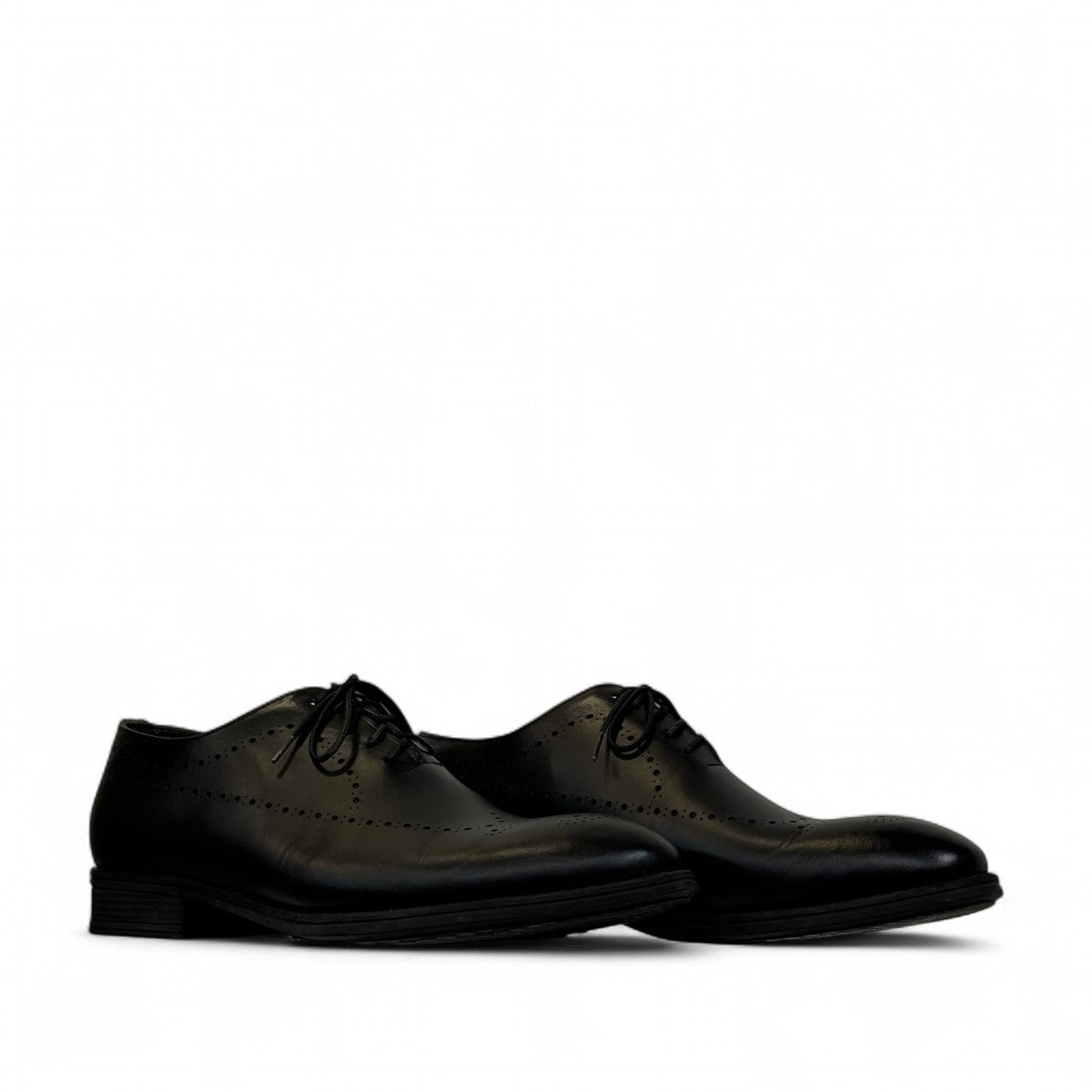 Sun Farhad black leather lace-up dress shoe with brogue detailing and a durable rubber outsole. Photo of side views.