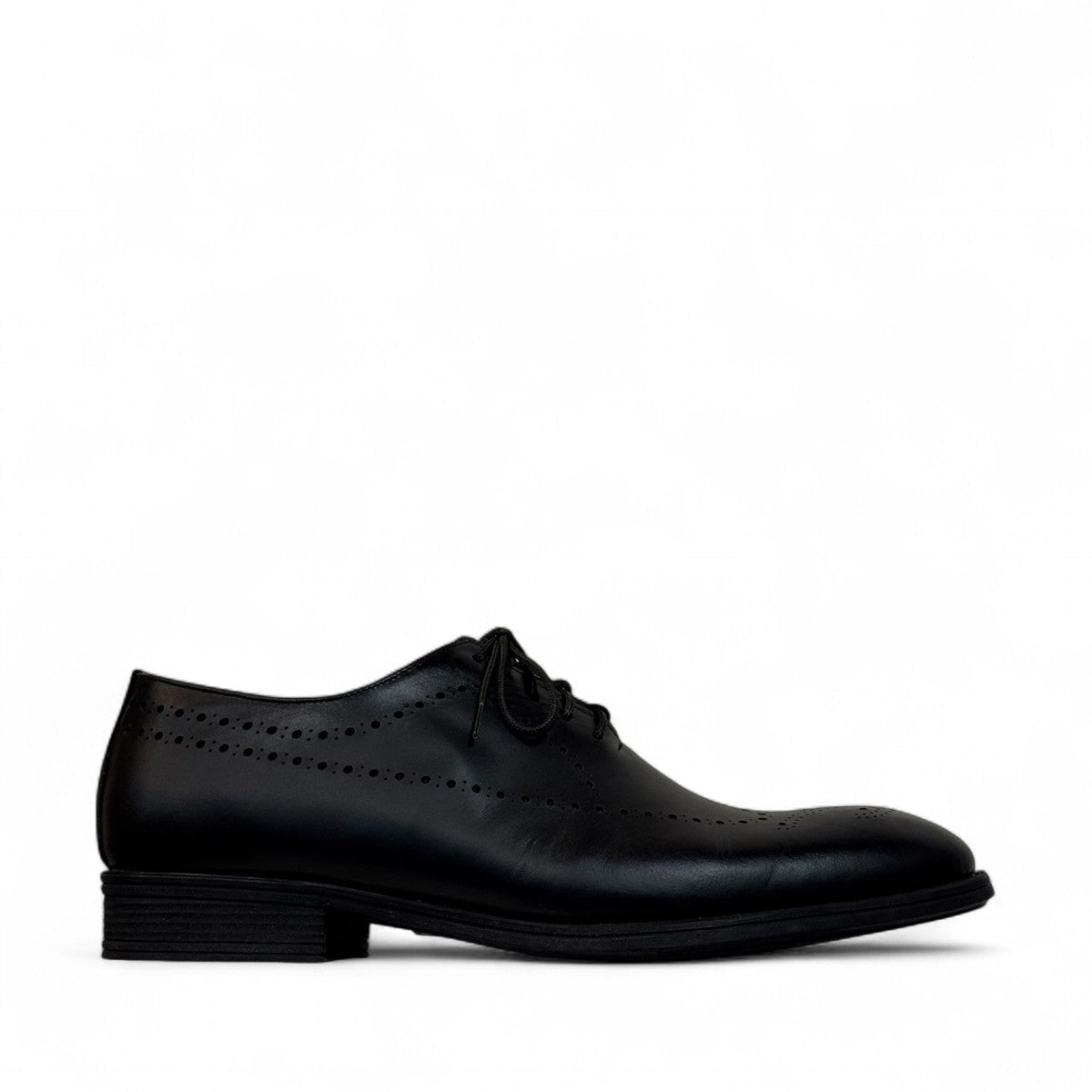 Sun Farhad black leather lace-up dress shoe with brogue detailing and a durable rubber outsole. Photo of left side view.