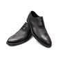 Sun Hesamak black leather lace-up dress shoe with brogue detailing and a durable rubber outsole. Photo of front view.