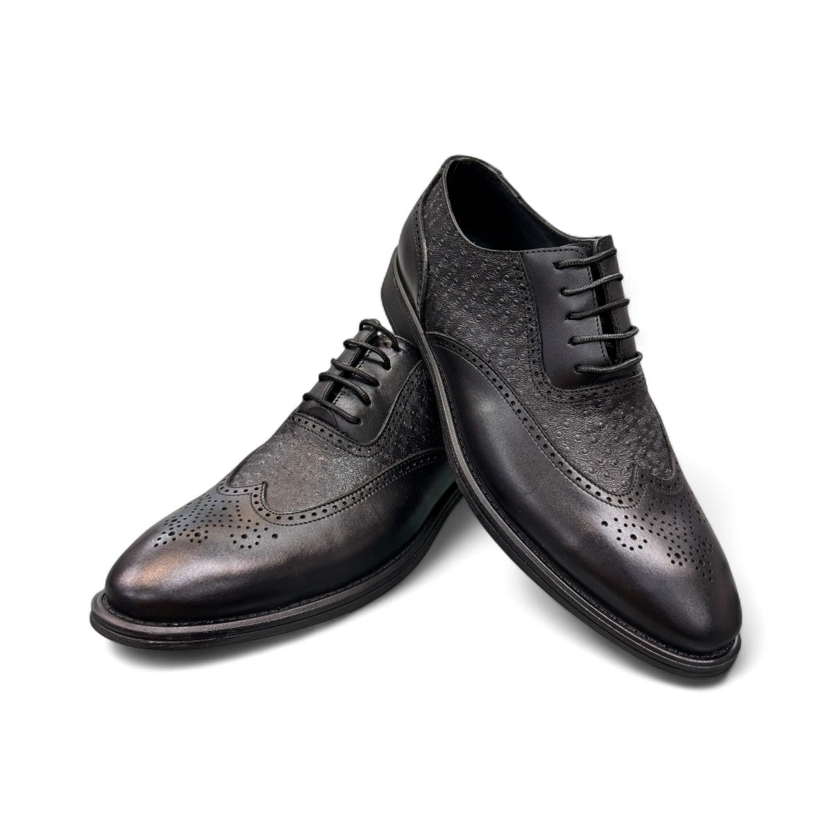 Sun Hesamak black leather lace-up dress shoe with brogue detailing and a durable rubber outsole. Photo of front view.