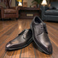 Sun Mahour black genuine leather lace-up dress shoe with a durable rubber outsole. Photo of front view 1.