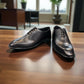 Sun Makan black genuine leather lace-up formal shoe with handmade stitching and rubber outsole. Photo of upper view 1.