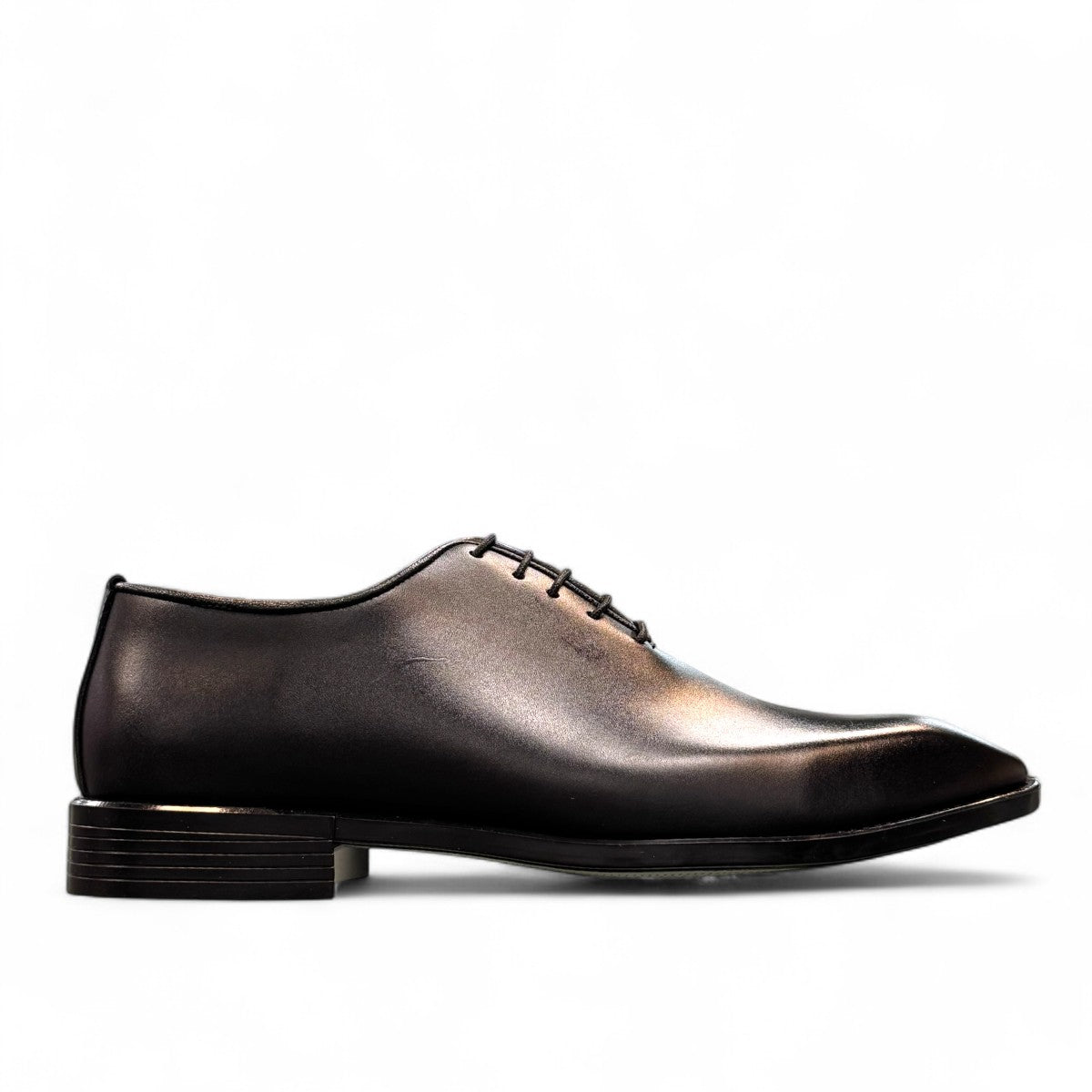 Sun Makan black genuine leather lace-up formal shoe with handmade stitching and rubber outsole. Photo of outside side view.