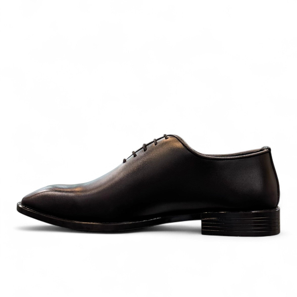 Sun Makan black genuine leather lace-up formal shoe with handmade stitching and rubber outsole. Photo of inside side view.