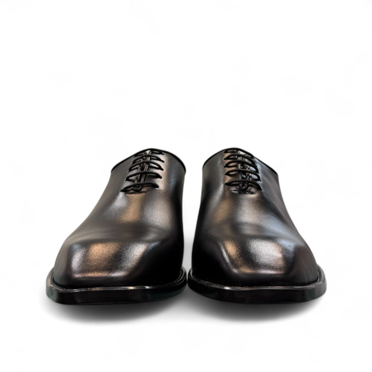 Sun Makan black genuine leather lace-up formal shoe with handmade stitching and rubber outsole. Photo of front view.