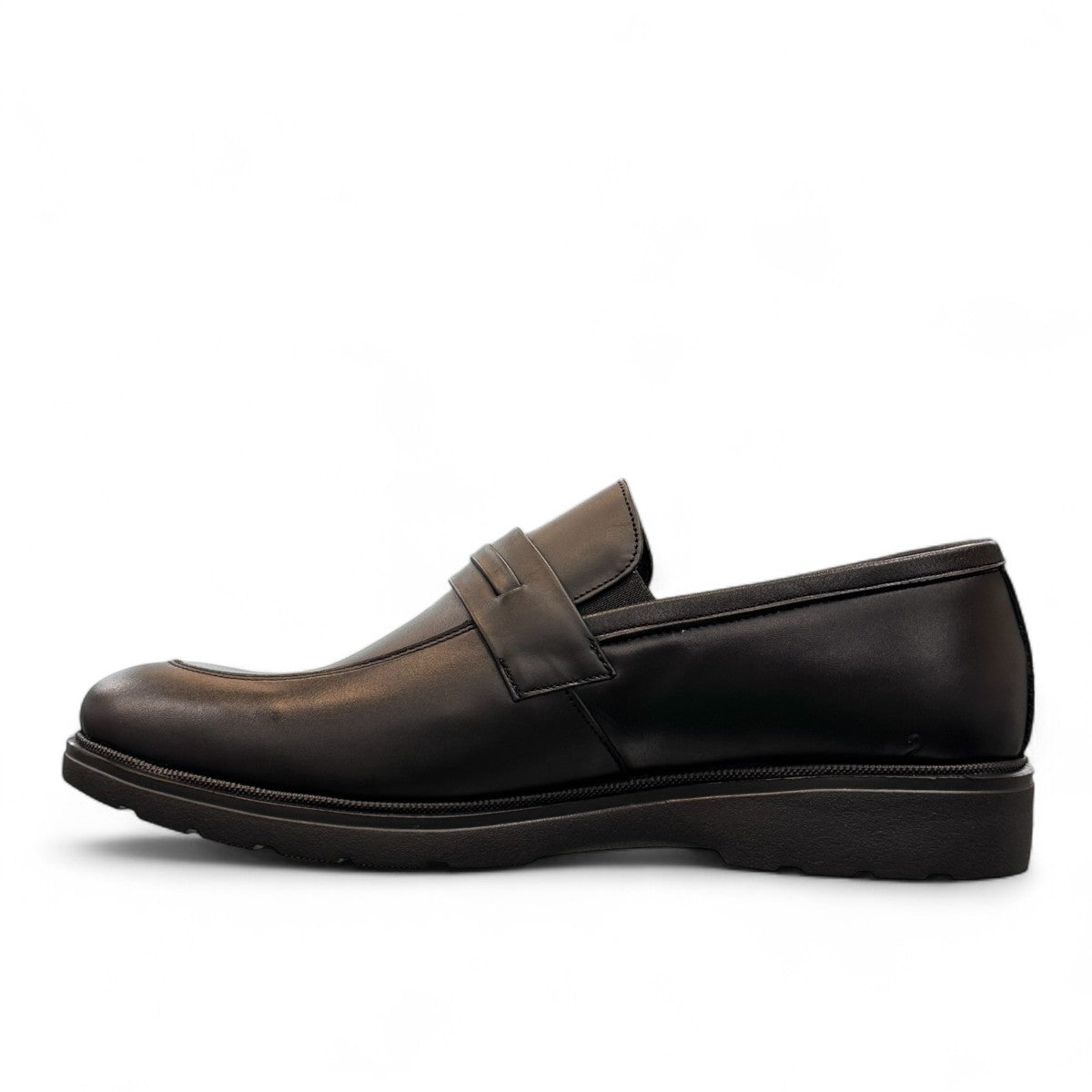 Sun Maku black leather loafer with a polished finish and durable rubber outsole for formal wear. Photo of side view at an angle.