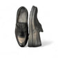 Sun Maku black leather loafer with a polished finish and durable rubber outsole for formal wear. Photo of sole.